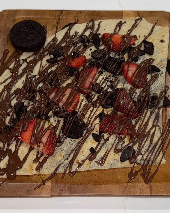 Waffle with cookies and chocolate drizzle